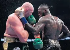  ??  ?? EMPATE. Wilder retuvo el título tras el nulo al llegar como campeón.