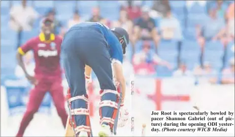  ?? (Photo courtesy WICB Media) ?? Joe Root is spectacula­rly bowled by pacer Shannon Gabriel (out of picture) during the opening ODI yesterday.