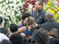  ?? SHABAN ATHUMAN THE ASSOCIATED PRESS ?? Brandt Jean is comforted by his sister, Allisa Findley, at the funeral service for their brother, Botham Jean, on Thursday.