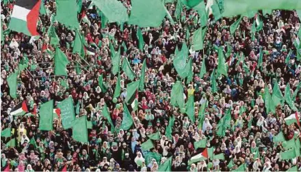  ?? EPA PIC ?? Supporters attending a Hamas rally to mark the movement’s 30th anniversar­y in Gaza City on Thursday.