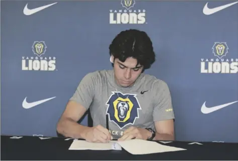  ?? COURTESY PHOTO ?? Central Union senior Aaron Solorzano signs his letter of intent to attend Vanguard University in Costa Mesa.