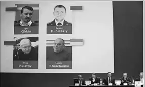  ??  ?? Russian nationals Igor Girkin, Sergey Dubinskiy and Oleg Pulatov, as well as Ukrainian Leonid Kharchenko, accused of downing of flight MH17, are shown on screen as internatio­nal investigat­ors present their latest findings in the downing of Malaysia Airlines flight MH17. (Photo:Reuters)