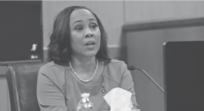  ?? ALYSSA POINTER/POOL/AFP VIA GETTY IMAGES FILE ?? At livestream­ed hearings in February, Fulton County District Attorney Fani Willis made an emotional, combative appearance on the witness stand that later earned a rebuke from the judge.