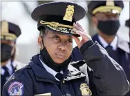  ?? AP PHOTO/ALEX BRANDON, FILE ?? In this April 2 file photo, acting chief of the U.S. Capitol Police Yogananda Pittman listens during a news conference after a car crashed into a barrier on Capitol Hill near the Senate side of the U.S. Capitol in Washington.