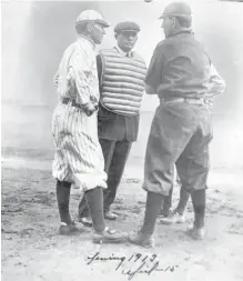  ?? CITY OF VANCOUVER ARCHIVES ?? Manager Bob Brown of the Vancouver Beavers, left, meets with umpire Pearle Casey and Tacoma Tigers manager Joe McGinnity on April 17, 1913. The Beavers won the first game at Athletic Park 8- 4.