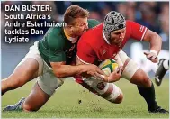  ?? ?? DAN BUSTER: South Africa’s Andre Esterhuize­n tackles Dan Lydiate