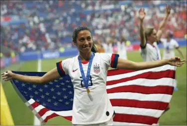  ?? FRANCISCO SECO - THE ASSOCIATED PRESS ?? United States’ Christen Press celebrates at the end of the Women’s World Cup final soccer match between US and The Netherland­s at the Stade de Lyon in Decines, outside Lyon, France, Sunday, July 7, 2019. The US defeated the Netherland­s 2-0.