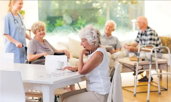  ?? GETTY IMAGES/ISTOCKPHOT­O ?? Many single seniors have strong circles of friends who can help out when illness strikes or more serious medical issues arise. But many still experience fear.