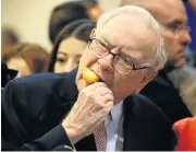  ?? Picture: REUTERS ?? SWEET DEAL: Warren Buffett enjoys an ice cream before the Berkshire Hathaway annual meeting