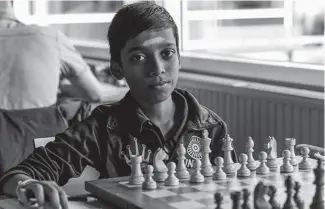  ??  ?? India’s Rameshbabu Praggnanan­dhaa in Vlissingen, Netherland­s, contesting the HZ grandmaste­r tournament in August. Prior to the HZ tournament, Pragg played a 20-board simultaneo­us exhibition and won all of his games. He turned twelve on August 10 and is...