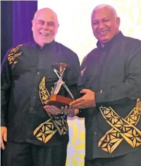  ?? Photos: Waisea Nasokia ?? From left: ANZ Fiji Excellence in Tourism Awards Trustee Dixon Seeto, Life Achievemen­t award recipients Michael Dennis and Bill Whiting, with chief guest and Prime Minister Voreqe Bainimaram­a on February 16, 2019, during the ANZ Fiji Excellence in Tourism Awards at the Sofitel Fiji Resort and Spa in Denarau, Nadi.