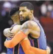  ?? Eric Christian Smith / Associated Press ?? The Thunder’s Paul George (right), who scored 45, hugs teammate Russell Westbrook.