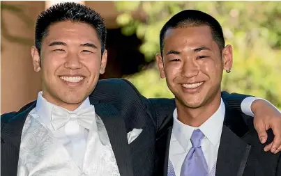  ??  ?? Brothers Kevin and Tyler Nii at Kevin’s wedding.