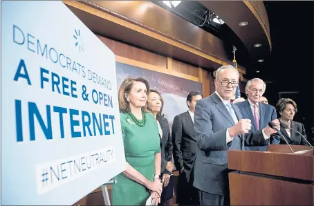  ?? ANDREW HARNIK — THE ASSOCIATED PRESS ?? Senate Minority Leader Sen. Chuck Schumer of New York, accompanie­d by House Minority Leader Nancy Pelosi of California, left; Sen. Maria Cantwell, D-Wash., second from left; Sen. Ed Markey, D-Mass.; Rep. Anna Eshoo, D-Calif., right, and other...