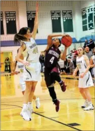  ?? BILL RUDICK — FOR DIGITAL FIRST MEDIA ?? Pottsgrove’s Diana Randleman drives against Bishop Shanahan’s Kathryn Greenhut Tuesday night.