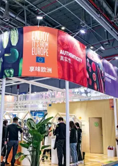  ?? ?? Booths promoting European food at the fourth CIIE on November 7, 2021.
