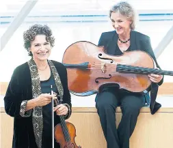  ?? TAFELMUSIK ?? Jeanne Lamon, left, violinist and ensemble musical leader, and her partner, cellist Christina Mahler, will be moving to Victoria at the end of June.