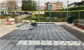  ?? Photograph: Stephen Burgen/The Guardian ?? The 50 sq metres of non-slip solar panels, installed in a small park in the Glòries area of the city, will generate 7,560kW a year, enough to supply three households.