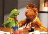 ??  ?? Kermit the Frog and Fozzie Bear were part of the 2015 ABC-TV series “The Muppets,” which drew attention for its single-camera mockumenta­ry style. It was not well-received and was canceled after one season.