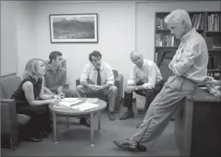  ?? KERRY HAYES, OPEN ROAD FILMS ?? Rachel McAdams, left, as Sacha Pfeiffer, Mark Ruffalo as Michael Rezendes, Brian D’Arcy James as Matt Carroll, Michael Keaton as Walter "Robby" Robinson and John Slattery as Ben Bradlee Jr., in a scene from "Spotlight."