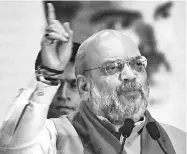  ?? PHOTO: PTI ?? Home Minister Amit Shah speaks at a rally on the Centre’s decision to abrogate Article 370 in Jammu & Kashmir and to campaign for Maharashtr­a Assembly polls, in Mumbai on Sunday
