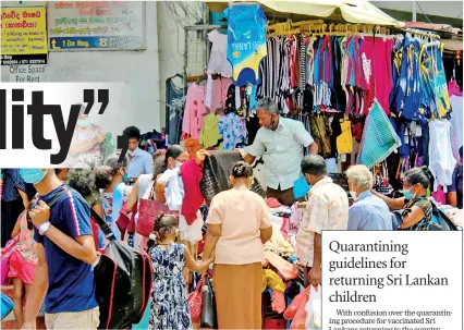  ??  ?? Avurudu shoppers in Pettah yesterday. Pic by Reka Tharangani­e
