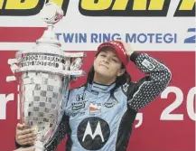  ??  ?? 0 Danica Patrick won the Indy Japan 300 to become the first woman driver to win an Indy car race today in 2008