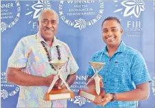  ?? Picture: REINAL CHAND ?? Outrigger Fiji Resort’s Kinijoji Sarai (left) won the Fiji Pride Champion award and Navneet Reddy won the Emerging Tourism Leader award during the 23rd Annual ANZ Fiji Excellence in Tourism Awards at Sofitel Fiji Resort and Spa in Denarau Nadi.