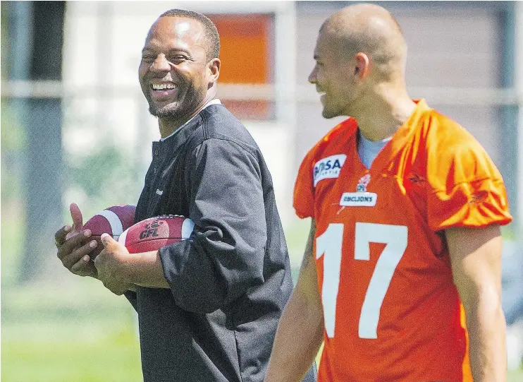  ?? RIC ERNST/PNG FILES ?? New offensive coordinato­r Jarious Jackson, left, was the B.C. Lions’ quarterbac­ks coach in 2013, so has already worked with veterans like receiver Nick Moore.