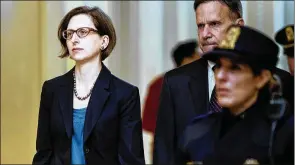  ?? ERIN SCHAFF / NEW YORK TIMES ?? Laura Cooper, a Pentagon official, arrives for a closed-door session with House impeachmen­t investigat­ors in Washington on Wednesday that was delayed by Republican lawmakers who burst into the secure suite. Cooper received a warning letter that shows how the Trump administra­tion has attempted to persuade officials to keep silent.