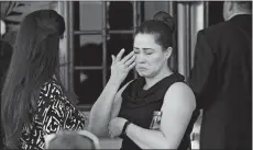  ?? CHRISTIAN CHAVEZ/AP PHOTO ?? A woman cries Thursday in Ciudad Juarez, Mexico, at the funeral of elementary school Principal Elsa Mendoza, one of the 22 people killed in a shooting last Saturday at a Walmart in El Paso, Texas. Mexican officials have said eight of those killed were Mexican nationals.