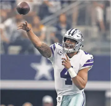  ?? MATTHEW EMMONS/USA TODAY SPORTS ?? Quarterbac­k Dak Prescott had a hand in four Cowboys touchdowns during the loss Sunday.