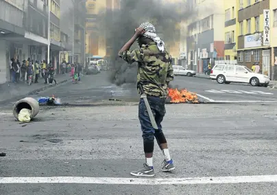  ?? Picture: TEBOGO LETSIE ?? NOT MY BROTHER: Foreigners in Durban’s Point area were up in arms and on the lookout for attacks by local residents in outbreaks of xenophobia last year. South Africans attack others from Africa but feel no hatred towards white immigrants