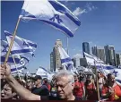  ?? (AP Photo/ Oded Balilty) ?? Israelis protest against plans by Prime Minister Benjamin Netanyahu’s new government to overhaul the judicial system, in Tel Aviv, Israel, Thursday, March 16, 2023.