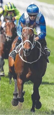  ?? Picture: GETTY IMAGES ?? Winx thrashes her rivals to chalk up her 21st successive win in the Turnbull Stakes at Flemington.