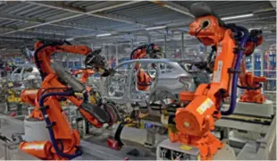  ?? ?? A robotic arm welds a vehicle body in the workshop at Plant Lydia of BMW Brilliance Automotive Ltd. in Shenyang, Liaoning Province, on February 16, 2022