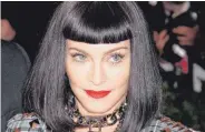  ?? FOTO: IMAGO ?? Erkannt? Madonna als Edelpunk im Jahr 2013 bei einer Benefizgal­a in New York.