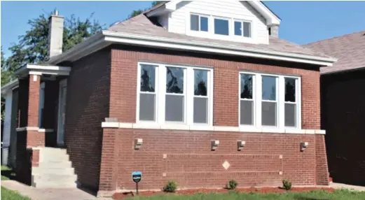  ?? COOK COUNTY LAND BANK AUTHORITY ?? This home on the South Side was rehabbed through the Cook County Land Bank Authority program.