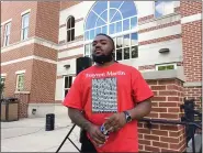  ?? EVAN BRANDT — MEDIANEWS GROUP ?? Troy Rivera, one of the organizers of Sunday’s protest and march listens to speakers in front of Pottstown Borough Hall.