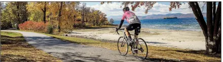  ?? Island Line Images ?? The 14-mile Island Line Trail through Vermont follows Burlington’s waterfront and continues into the middle of Lake Champlain. The trail is just one of New England’s scenic bike trails.