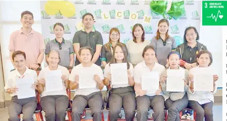  ?? PHOTOGRAPH COURTESY OF JFC ?? SENIOR and PWD hires show their orientatio­n certificat­es at the Greenwich branch in Muntinlupa City Hall.