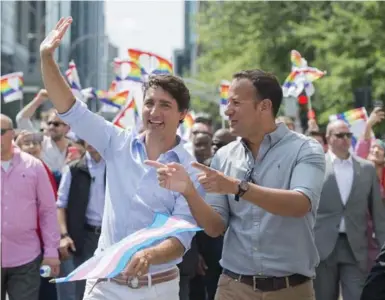  ?? GRAHAM HUGHES/THE CANADIAN PRESS FILE PHOTO ?? Prime Minister Justin Trudeau was joined by Irish Taoiseach Leo Varadkar at the annual Pride parade in Montreal on Aug. 20.