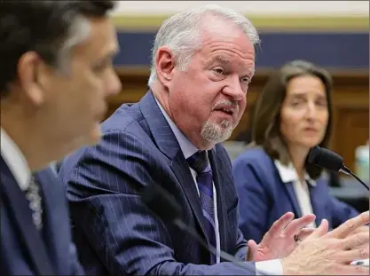  ?? Alex Wong / Getty Images ?? Professor at George Washington University Jonathan Turley, Vice President of Customer Security & Trust at Microsoft Tom Burt, and Counsel Lynn Oberlander at Ballard Spahr testify Wednesday in Washington.