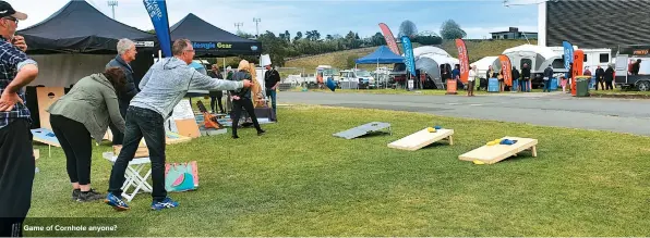  ??  ?? Game of Cornhole anyone?