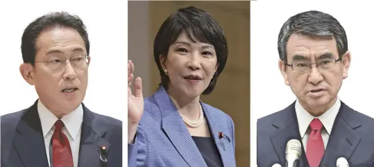  ??  ?? Above: From left, Fumio Kishida, Sanae Takaichi and Taro Kono
Below: Liberal Democratic Party Headquarte­rs are seen in Chiyoda Ward, Tokyo.