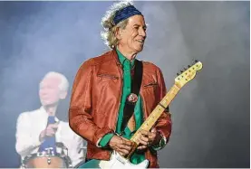  ?? Boris Horvat / AFP / Getty Images ?? The Rolling Stones and guitarist Keith Richards keep rolling on.