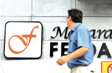  ?? — Bernama photo ?? FGV says its weaker earnings and revenue for the six-month period was mainly due to higher losses registered in the plantation sector as a result of lower sales volume.