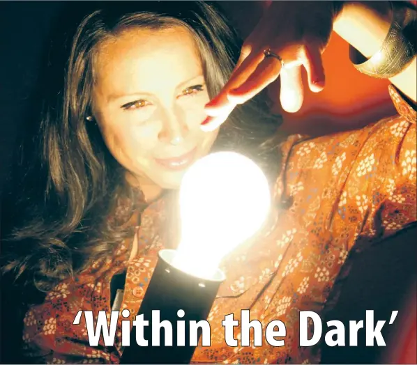  ?? — Submitted photo ?? Singer/songwriter Dana Parsons will release her long-awaited second record “Within the Dark” with a party at the Rock House on George Street tonight.