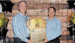  ?? SHERI ARMSTRONG CITY OF NIAGARA FALLS ?? Wernher Verbraeken, left, celebrates his Doug Austin Memorial Award as Niagara Falls sportspers­on of the year for 2021 with Tony Arcuri, the 2018 winner. The two co-founded the Niagara Falls Rowing Club in 2012.