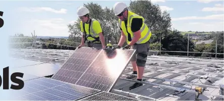  ??  ?? Three Swansea schools, including Pontarddul­ais comprehens­ive, pictured, are set to see their energy bills reduced after they had solar cells fitted.